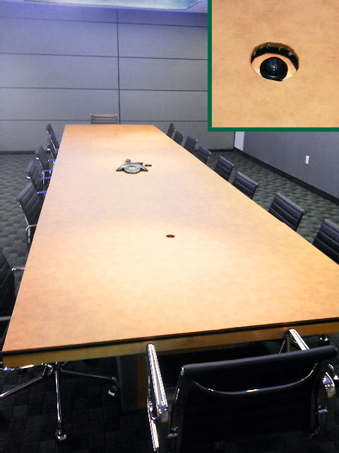 Conference table photo with cutout hole detail
