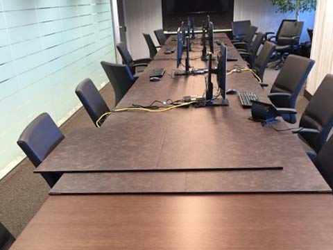 Conference table pad with computers
