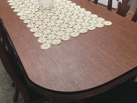 Protective cherry wood dining table pad with large round corners