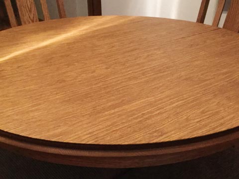 Circular dining room table protector pad photo