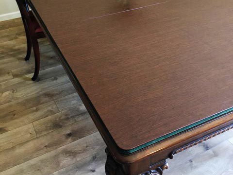 Dining table pad with small round corners