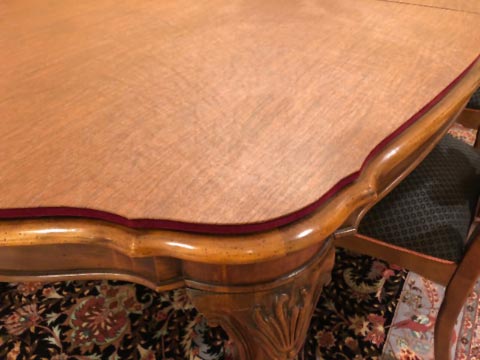 Custom scalloped-edge table protector close-up